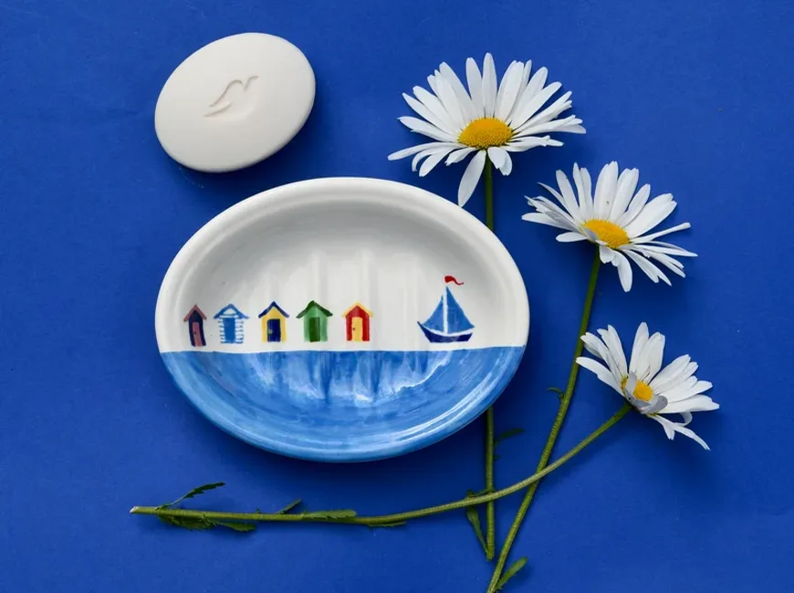 Hand-painted beach hut ceramic piece