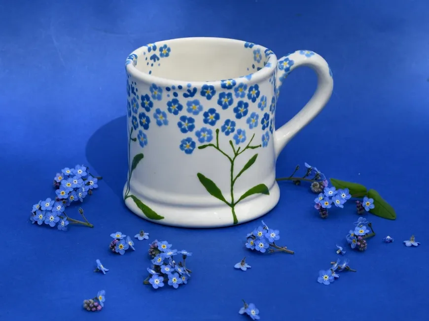 Hand-painted country mug with wildflower design